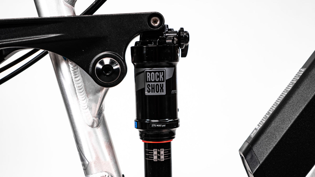 full suspension bike middle pivot